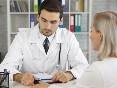 close-up-doctor-checking-patient